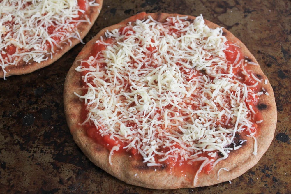 grilled-pita-pizzas-with-prosciutto-chanterelles-arugula-and-a-fried-egg-step-6