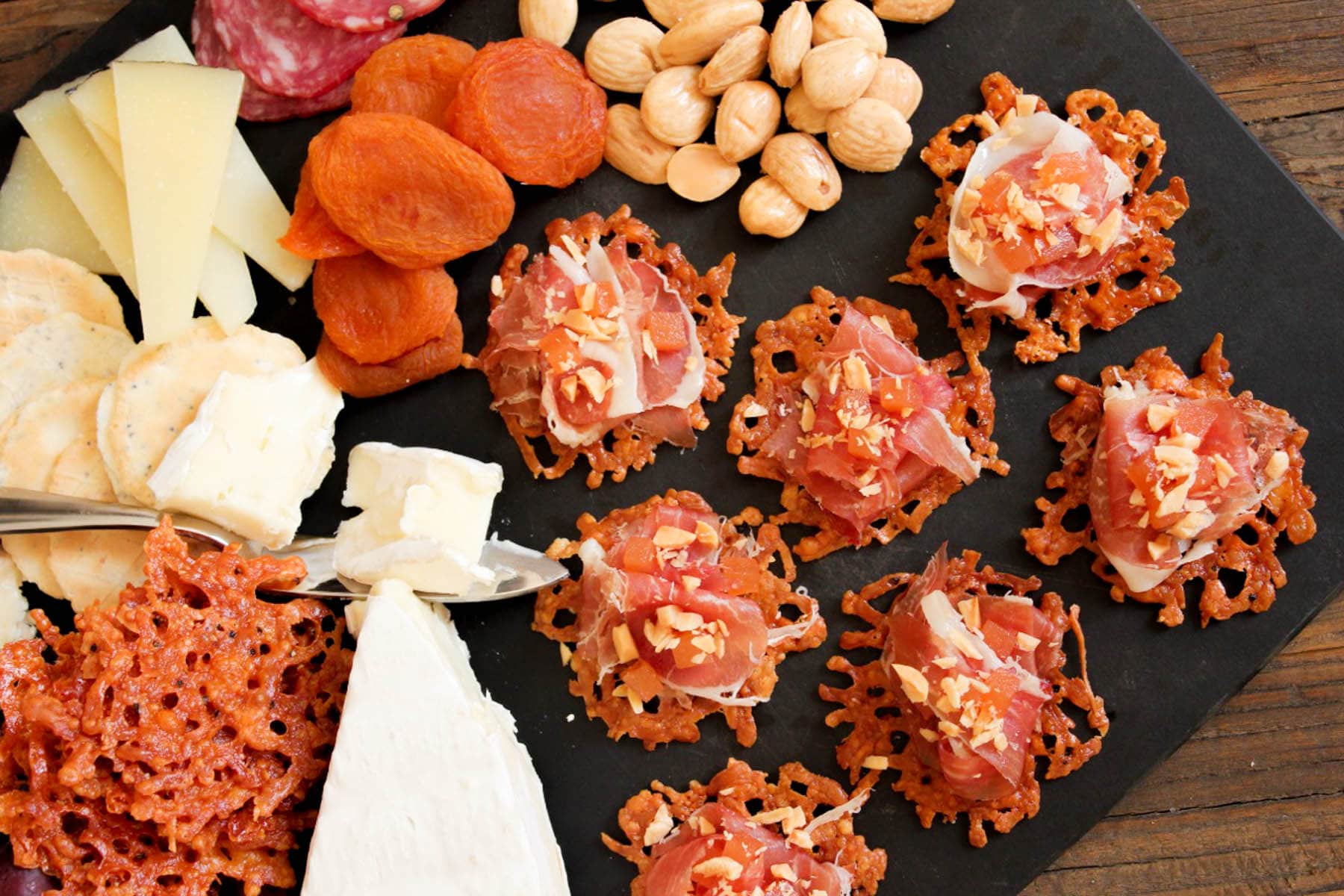 Manchengo-crisps-with-serrano-ham-quince-paste-and-marcona-almonds-6