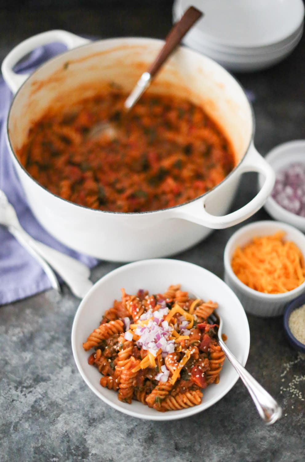 cheeseburger pasta in a bowl with garnishes